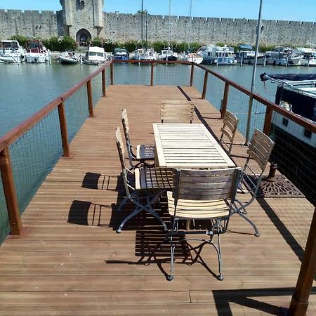 Peniche Poompui Hotel Aigues-Mortes Bagian luar foto